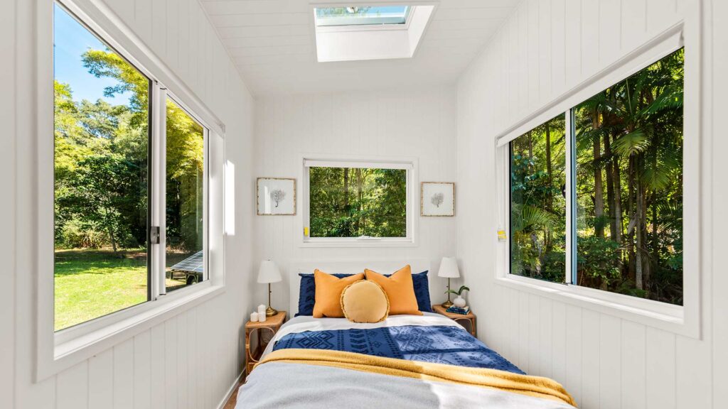 Tiny House Bedroom with windows and skylight