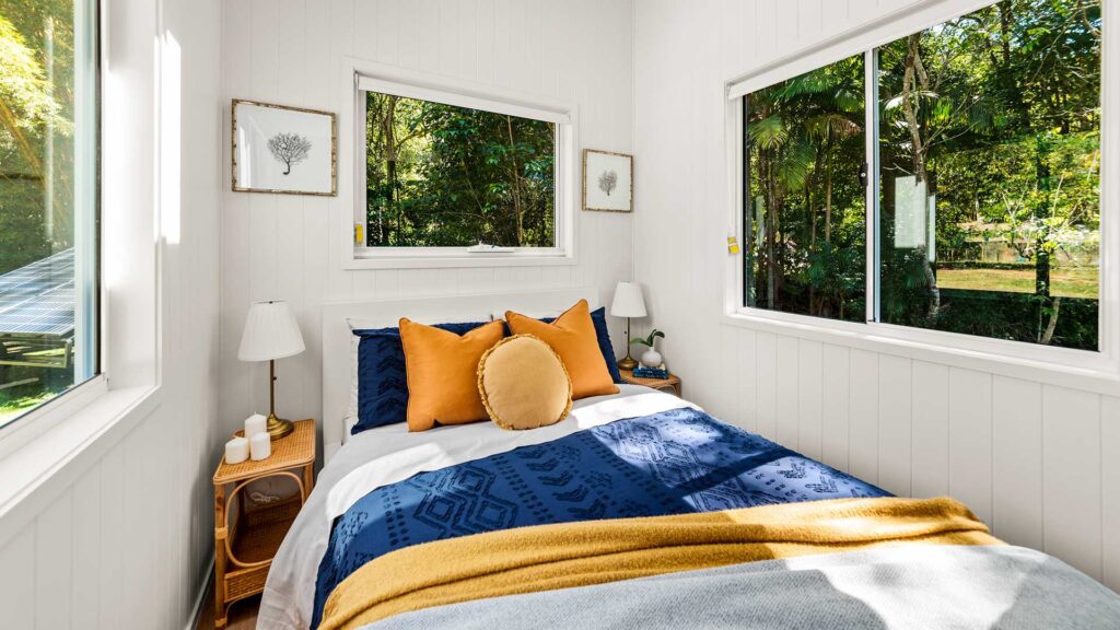 Tiny House bedroom with windows for natural light