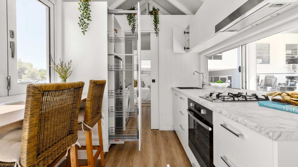 Tiny House kitchen with a pull-out pantry