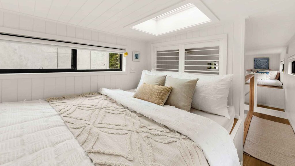 tiny house with loft shutters for privacy